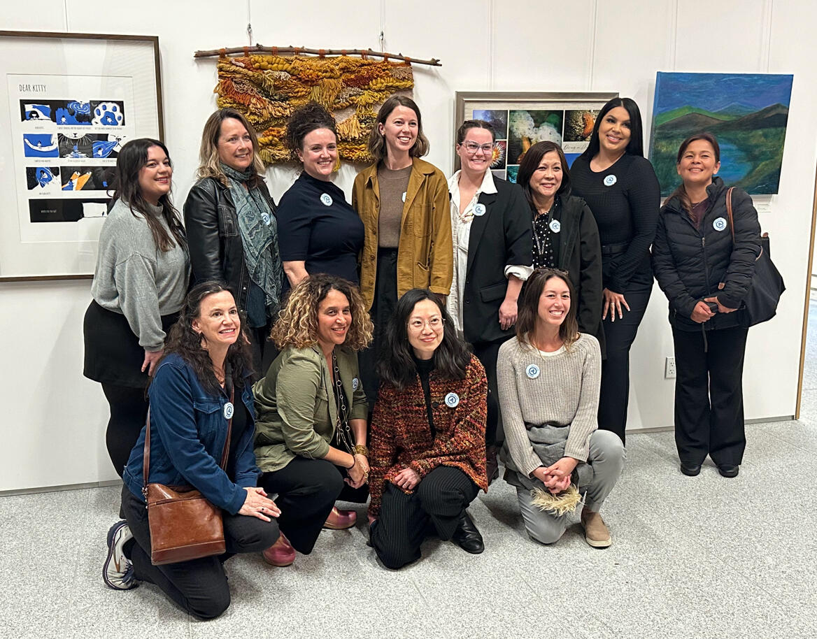 group of artists in san mateo county, california, all wearing "artists at work" badge