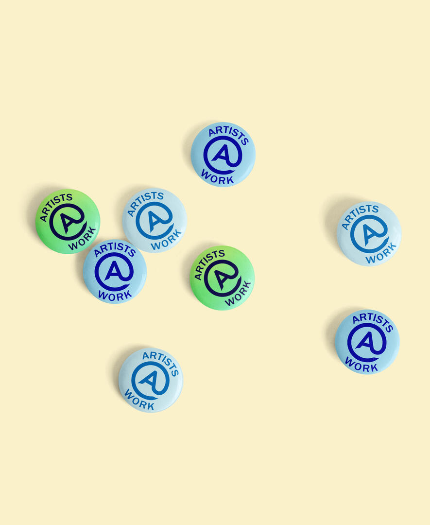 mock up of "Artists at Work" badges, 2025